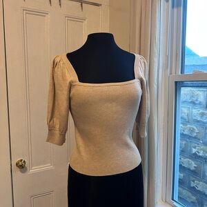 Tan knitted square neck top with cute puffy sleeve and ribbed detail.